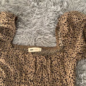 Fashion nova vintage cheetah print midi dress , fitting , classy.